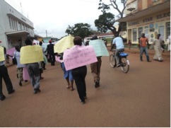 public advocacy march through town promoting HIV awareness