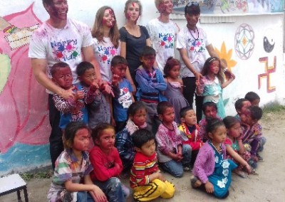 Volunteers and kids Holi festival India