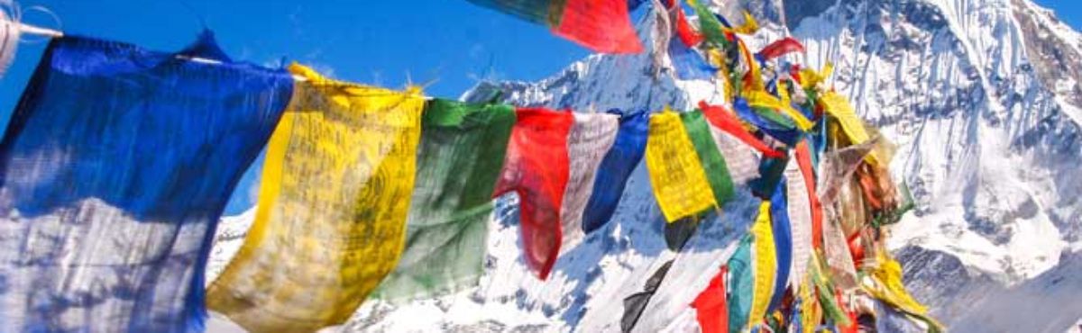 colourful flags on mountain with snow