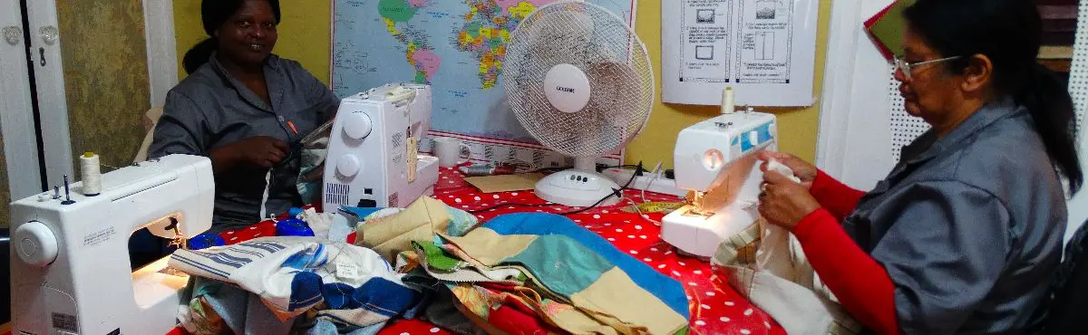 Artisans making bags sustainable livelihoods internship in Cape Town