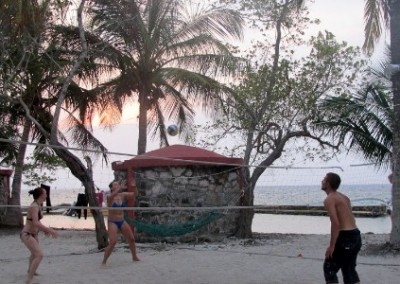 Beach volleyball family reef conservation Belize