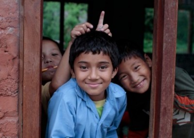 Boys pulling faces Day Care Center and Education Support in Nepal