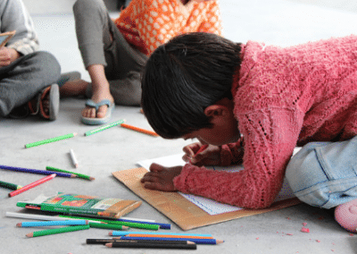 Child colouring in Child Development Volunteering in India