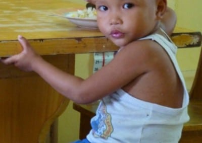 Child eating dinner Work in an Orphanage in the Philippines