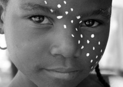 Child with painted face 2 photography and conservation in Kruger South Africa