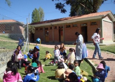 Children playing outside children's centre Bolivia