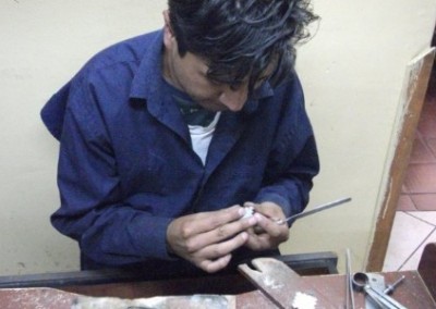 Craftsman making jewellery Inca jewellery making cooperative Peru