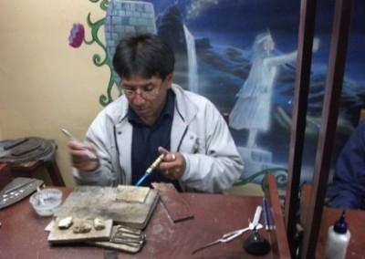 Craftsman Inca jewellery making cooperative Peru
