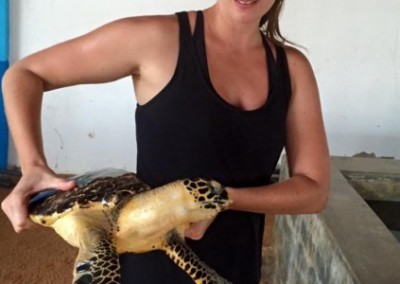 Female volunteer with turtle Turtle Conservation in Sri Lanka