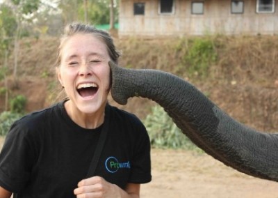 Girl with trunk Community and Conservation Volunteering in Chiang Mai in Thailand