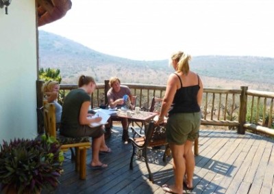 Group meeting on balcony family wildlife research South Africa