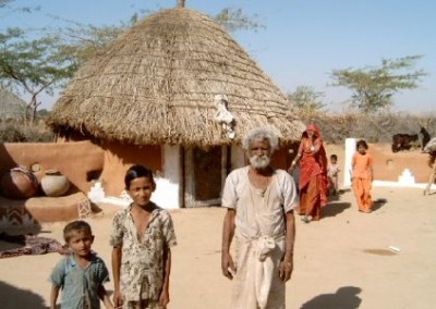 Locals outside Renovation and Community Building in India