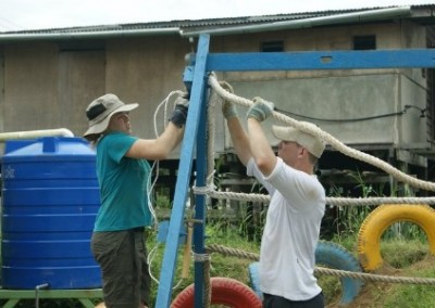 Making climbing frame family volunteering community empowerment in Borneo