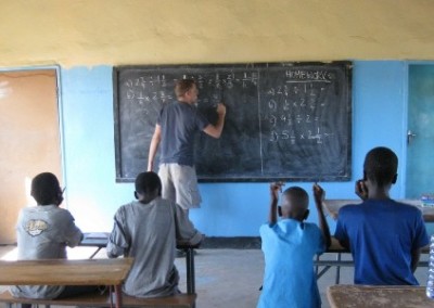 Male volunteer teaching Teaching and Community Work in Zambia