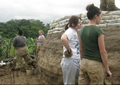 Mud hut in progress family building Belize