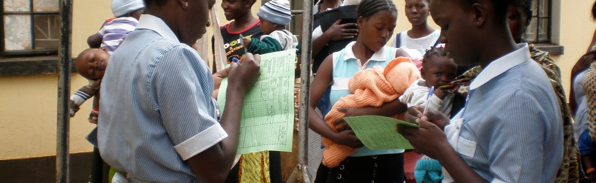 Nurses writing down weights Zambia