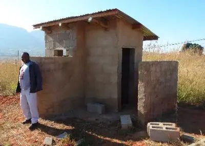 Proud of his toilets project coordinator Building Swaziland