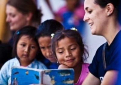 Reading with children education outreach for child workers Ecuador