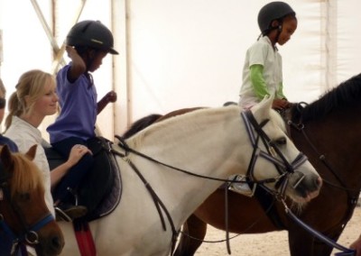 Volunteer and children equine therapy for disabled children South Africa