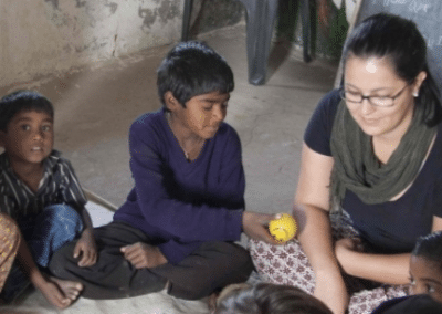 Volunteer and two kids Experience India and Volunteering in India