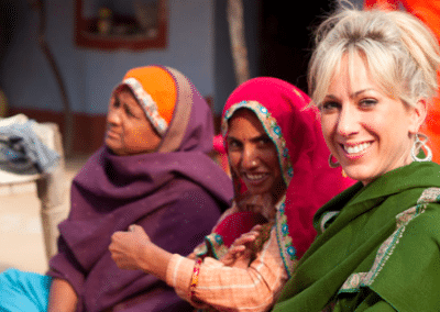 Volunteer with two women Women's Empowerment in India