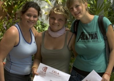 Volunteers with certificates teach in elementary schools Costa Rica