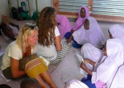 Volunteers with children Teaching and Community Work in Zanzibar