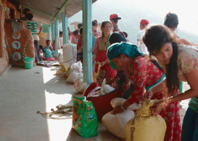 Women with sacks Day Care Center and Education Support in Nepal