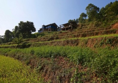At her farm buildings Empower Women on Sustainable Agriculture Initiative in Nepal