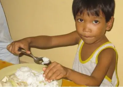 Boy eating nutrition Phils
