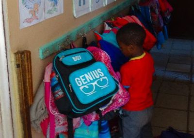 Hout Bay Boy with school bag Early Years Internship in Cape Town