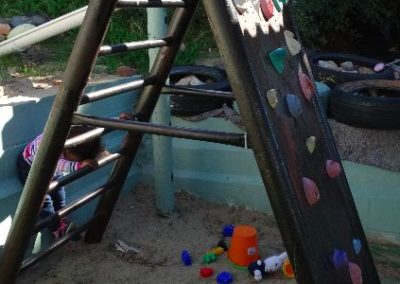 Hout Bay Child on climbing frame Early Years Internship in Cape Town