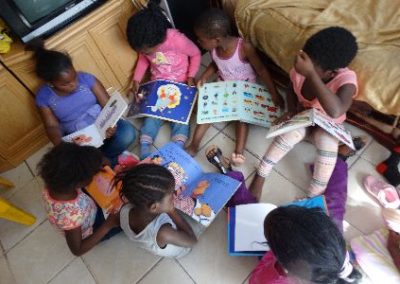Hout Bay girls reading Early Years Internship in Cape Town