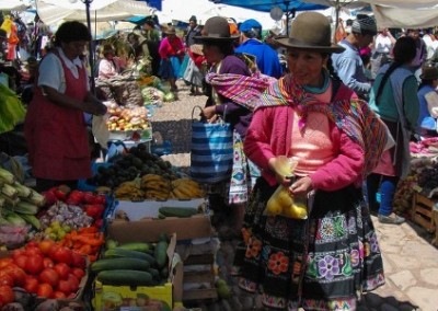 Lady in the market support for young mothers Peru