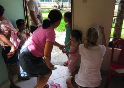 Stood at doorway Improve Nutritional Standards in the Philippines