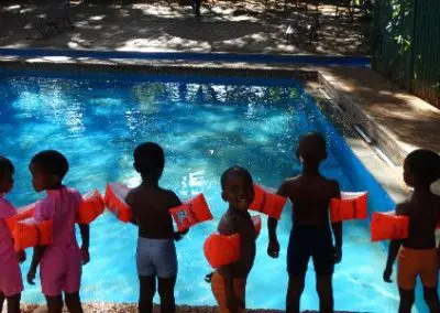 Volunteer abroad in Swaziland Sports project kids lining up for swimming