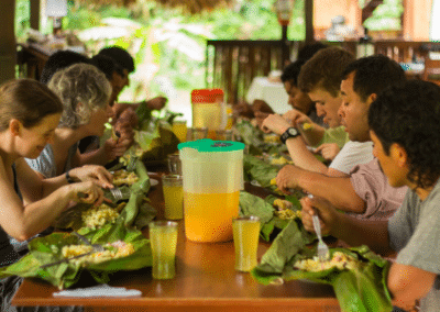 Volunteers eating together environmental conservation Peru