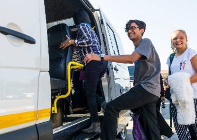 Volunteers getting on transfer bus Accommodation South Africa