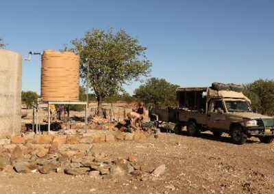 Volunteers next to truck Elephant and Water Access project Namibia