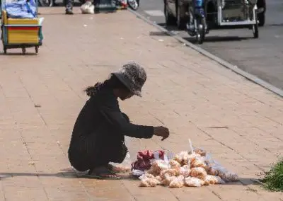 Phnom Phen Person selling in the street