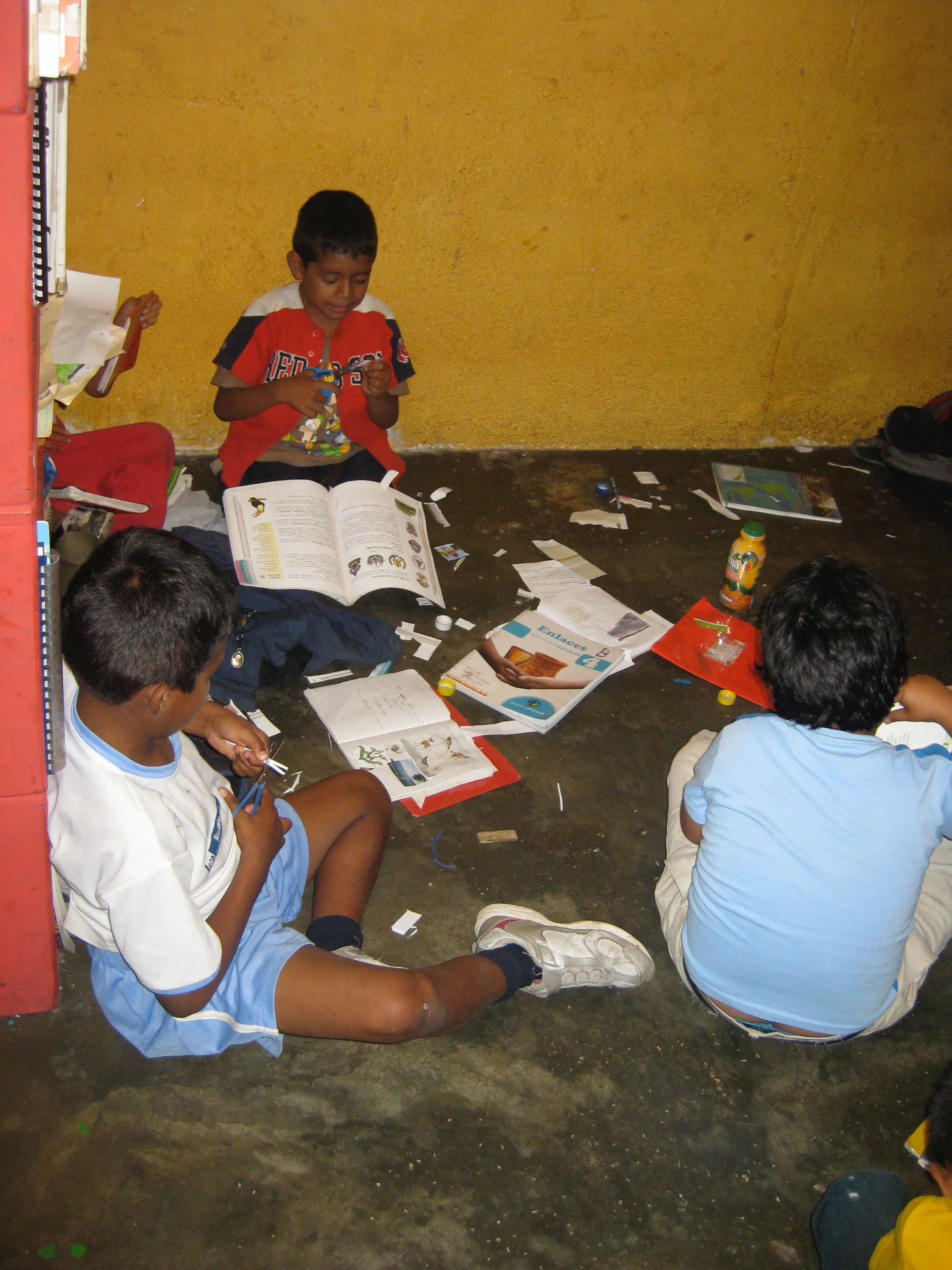 Students studying at the after school club on study and service project