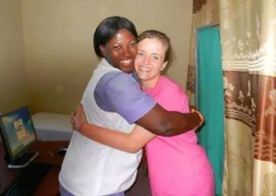Public Health Internship Volunteer hugging a local nurse