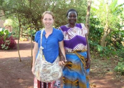 An intern with a local posing together for a photo.