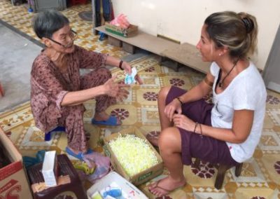 A volunteer with a local woman.