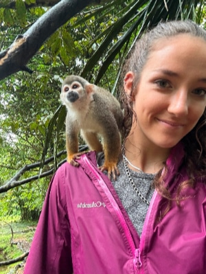 Carly with monkey in Ecuador